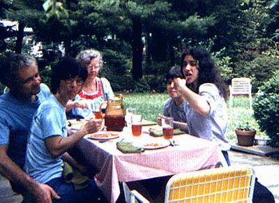 Joey, Mary, Jackie, Tommy, and Marceline picnicking in their back yard.  [33 kb]