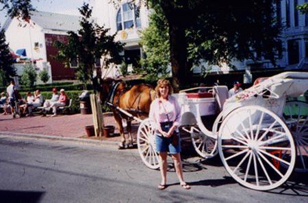 Lois downtown with horse and carriage